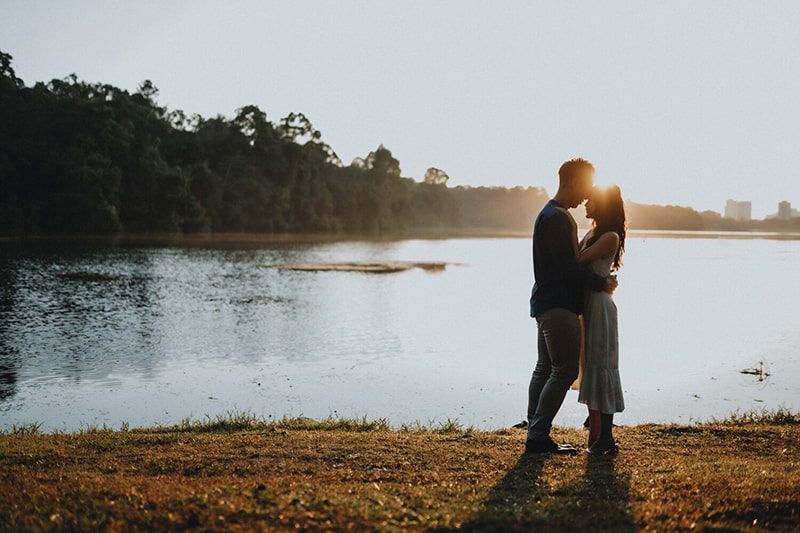 a photo of a couple together at a sunset/sunrise