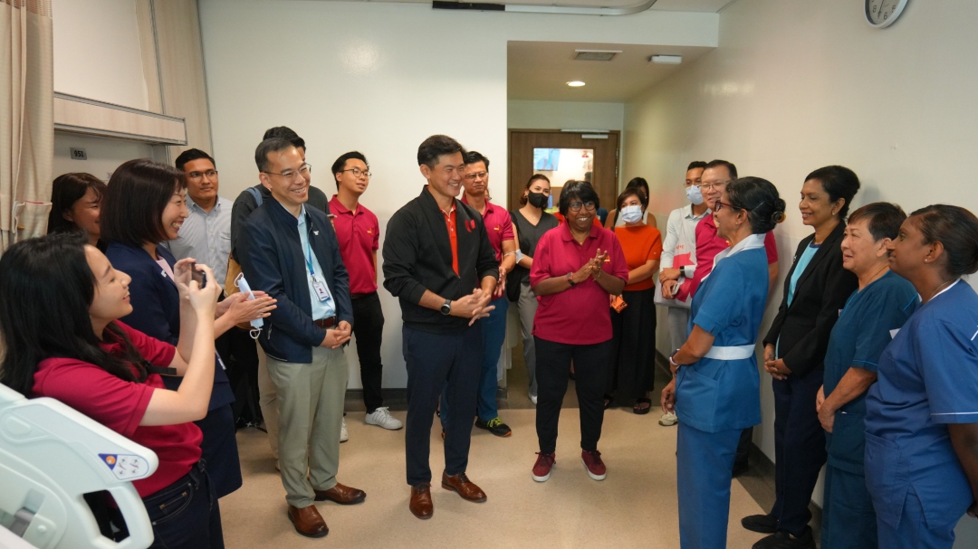 NTUC Deputy Secretary-General Desmond Tan visiting Tan Tock Seng Hospital.jpg