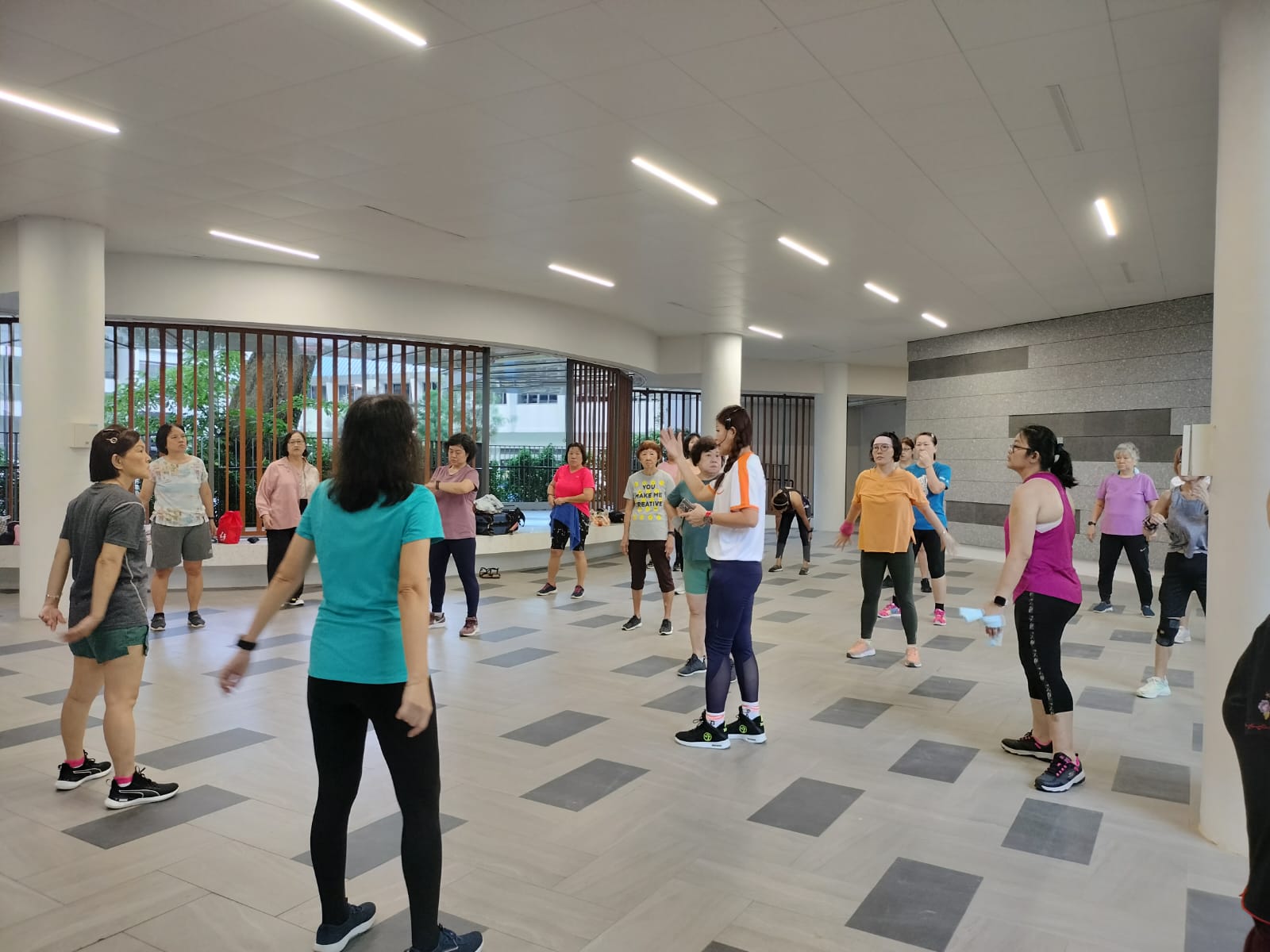 Liu Puay Lin leading a group exercise class
