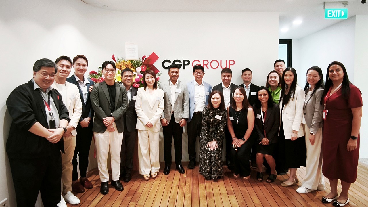Cornerstone Global Partners, together with members from NTUC SME Partners and The Singapore Manual & Mercantile Workers' Union, at the company's new office on the day it gave formal recognition to the union.