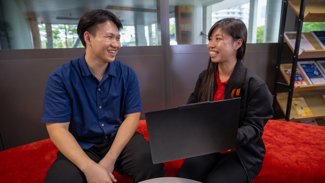e2i career coach Priscilla Tan with a jobseeker.jpg