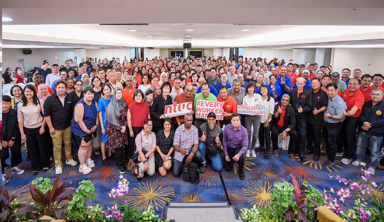 Thumbnail-Mr Tharman surrounded by union leaders at OTCi dialogue.jpg